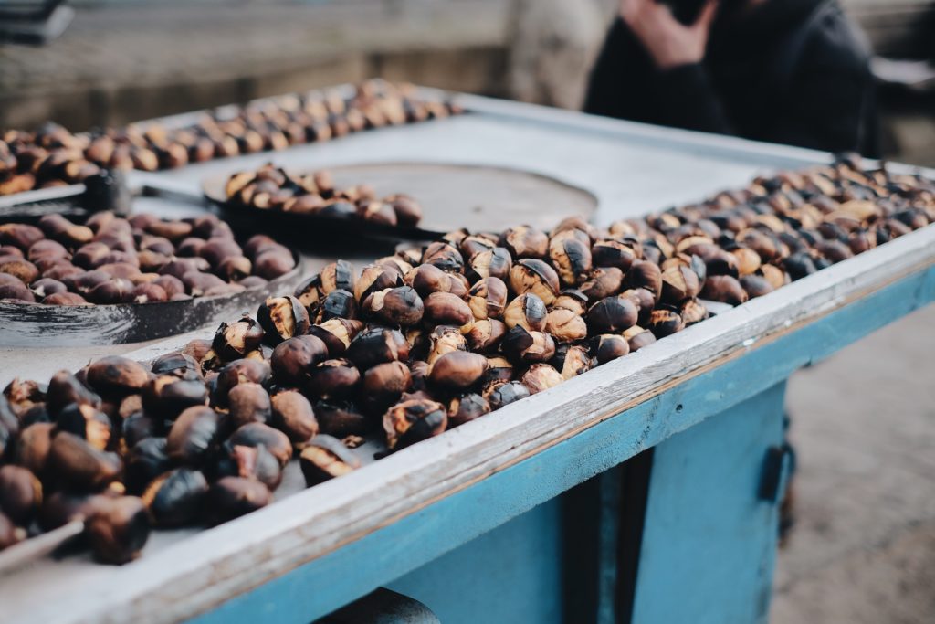 Roasted chestnuts - a favorite fall delicacy among locals. Photo by Emre on Unsplash